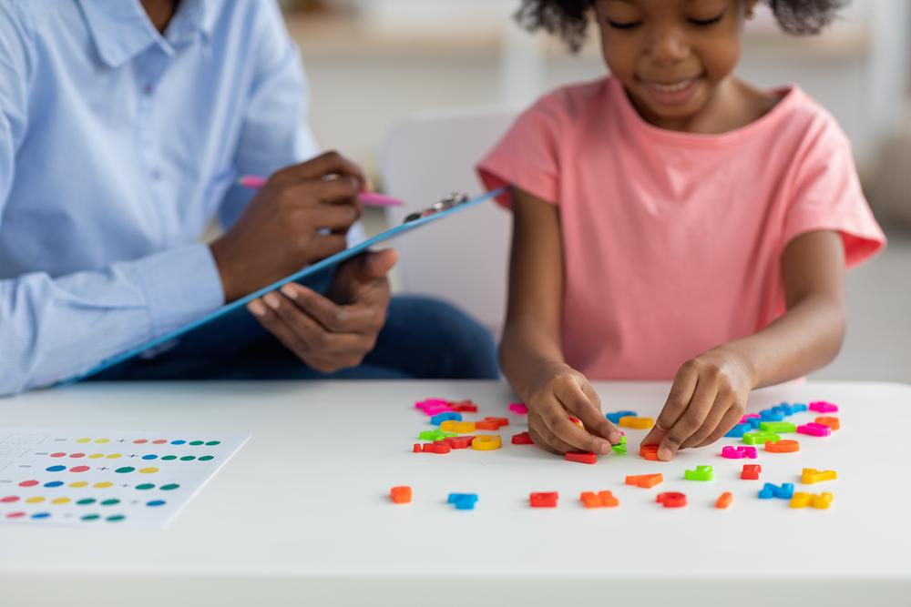 660c118de1b63563cf264fbc_cute-african-american-child-playing-with-colorful-2023-11-27-05-08-09-utc (Copy)